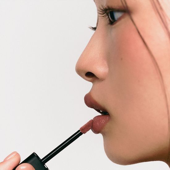 Javinde Seoul Wink Lip Shade Primer 5g in Neutral Lavender variant, showcasing its smooth texture and vibrant color.