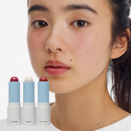 Alt text: Sennok Soft Lip Balm 4g in Apricot Peach flavor, part of a three-color set including Original and Grape Berry, showcasing a vibrant tube design.