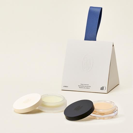 Anillo Scent Balm 5g in Fig Whiskey fragrance, featured in a sleek container, perfect for on-the-go personal care.